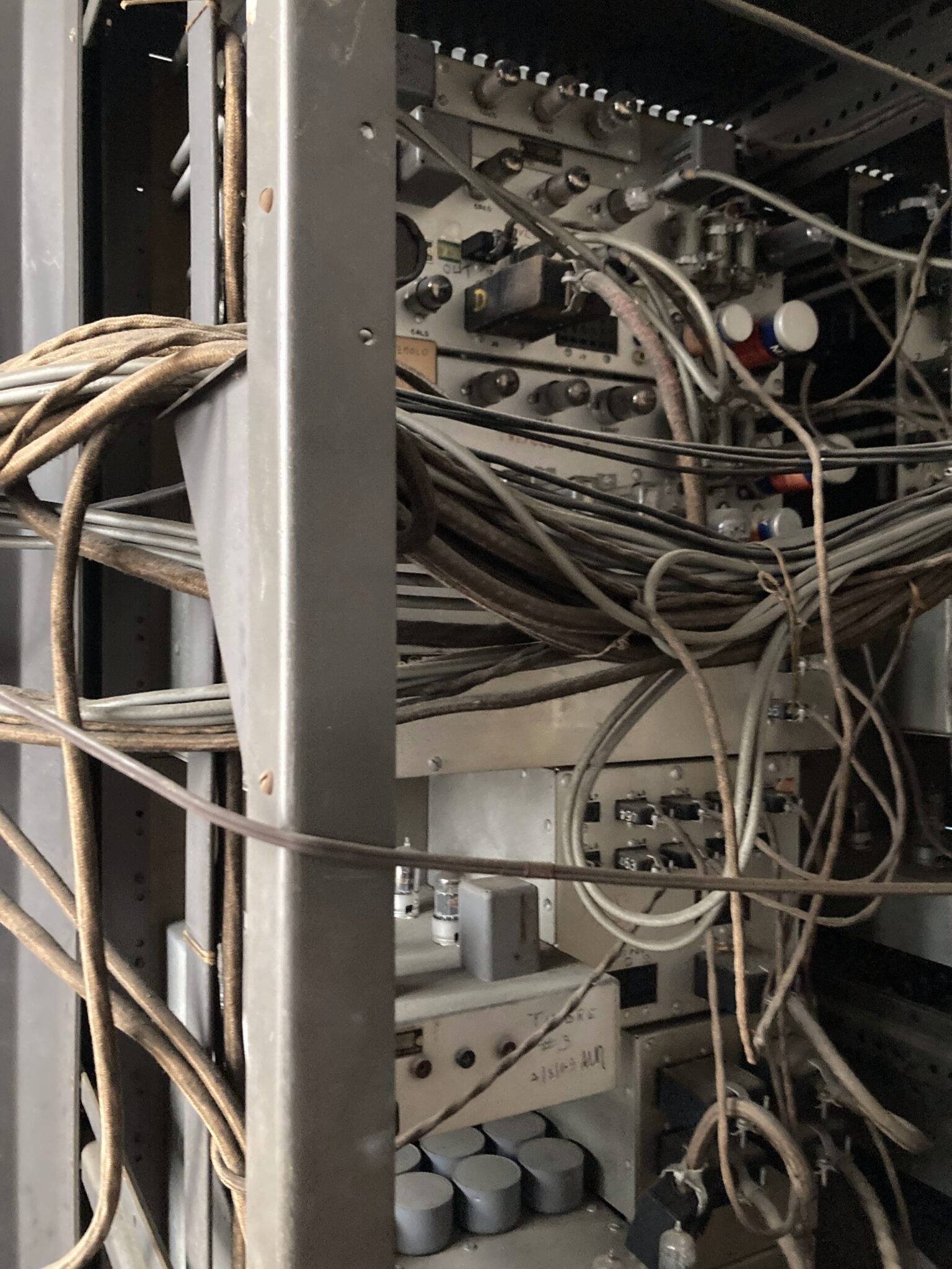 Rare view of the cables inside the 19 inches racks. A lot of cables and valves.